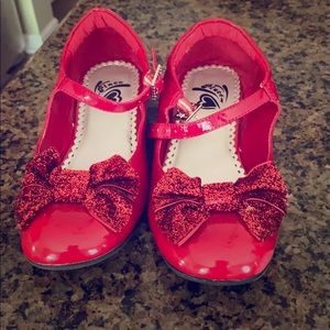 girls red slip on ankle buckle flats